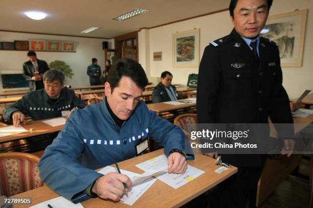 Foreign inmates attend the Hanyu Shuiping Kaoshi test at the Shanghai Qingpu Prison on December 10, 2006 in Shanghai, China. HSK test, or the Chinese...