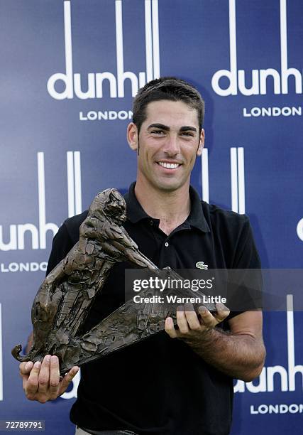 Alvaro Quiros of Spain poses with the trophy after winning The Dunhill Championships on a score of 275 at The Leopard Creek Country Club on December...