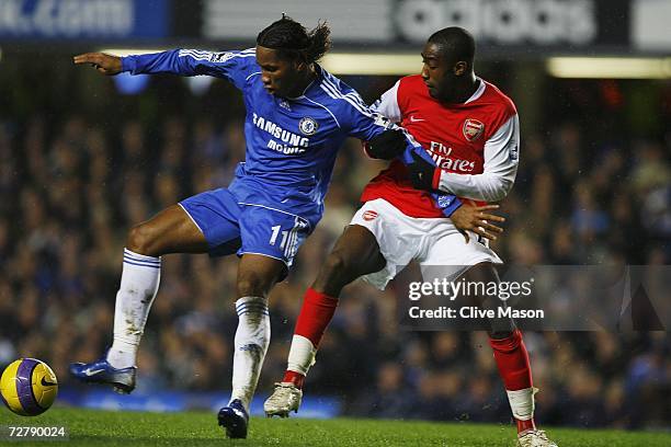 Didier Droga of Chelsea holds off Johan Djorou of Arsenal during the Barclays Premiership match between Chelsea and Arsenal at Stamford Bridge on...