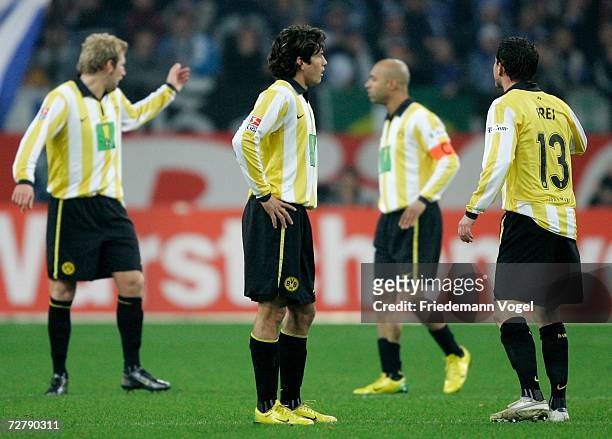 Florian Kringe, Nelson Valdez, Dede and Alexander Frei of Dortmund look dejected during the Bundesliga match between Schalke 04 and Borussia Dortmund...