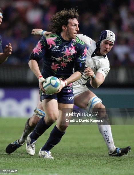 Mauro Bergamasco of Stade Francais moves away from Chris Jones during the Heineken Cup match between Stade Francais and Sale Sharks at Parc des...