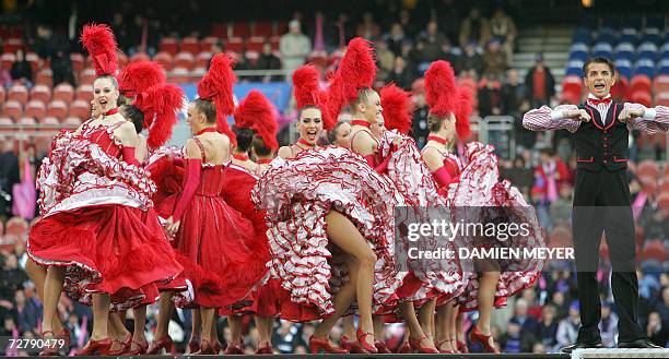 Moulin Rouge dancers perform before the European Cup rugby union match Stade Francais vs Sale, 10 December 2006 at the Parc des Princes stadium in...