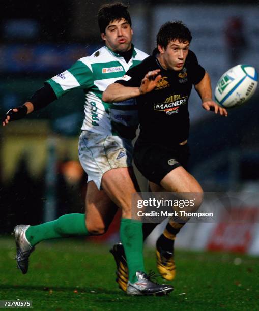 Dominic Waldouck of London Wasps tangles with Massimiliano Perziano of Benetton Treviso during the Heineken Cup round three match between London...