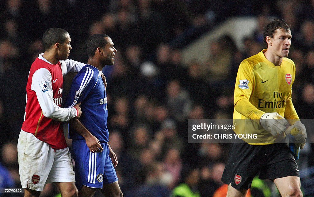Chelsea's Ashley Cole (C) reacts to a co