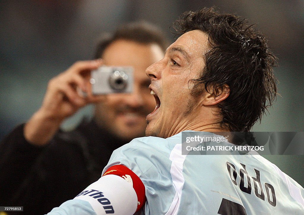 Lazio's captain Massimo Oddo celebrates