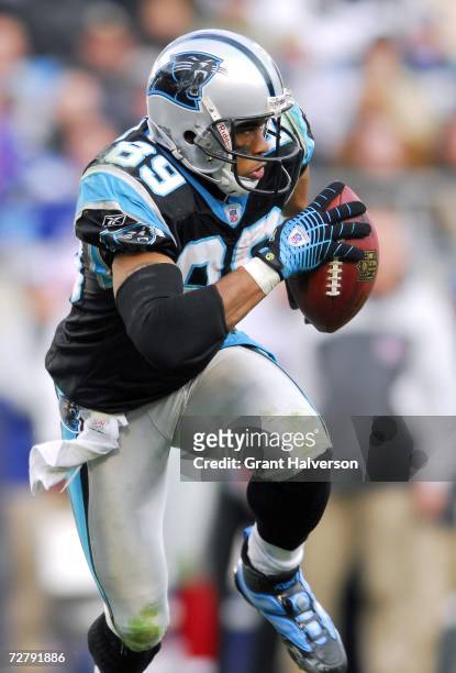 Steve Smith of the Carolina Panthers returns a punt against the New York Giants on December 10, 2006 at Bank of America Stadium in Charlotte, North...