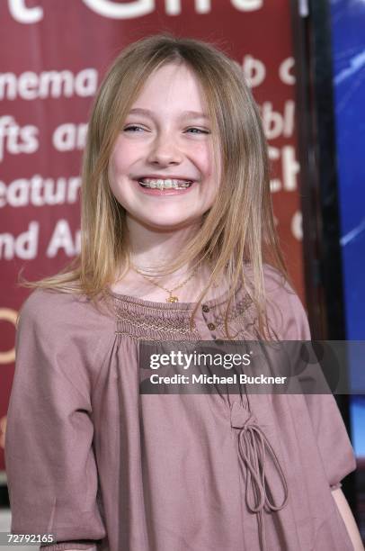 Actress Dakota Fanning arrives at the Los Angeles premiere of Paramount's Charlotte's Web at the ArcLight Theatre December 10, 2006 in Los Angeles,...