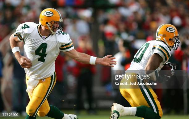 Brett Favre of the Green Bay Packers hands off the ball to Donald Driver during the NFL game against the San Francisco 49ers at Monster Park on...