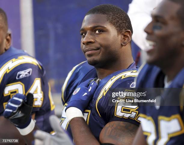 LaDainian Tomlinson of the San Diego Chargers stands on the sideline after breaking the NFL record for single-season touchdowns, with 29 touchdowns,...