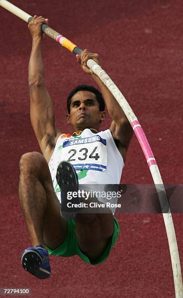 Vinod of India competes in the Men's Pole Vault discipline in the Men's Decathlon during the 15th Asian Games Doha 2006 at the Khalifa Stadium...