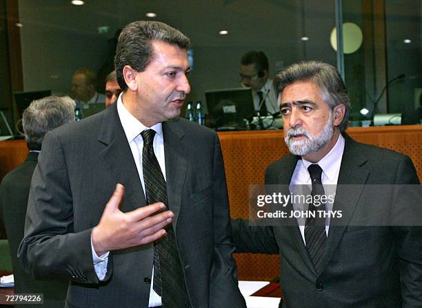 Cypriot Foreign Affaires Minister George Lillikas chats with his Portuguese counterpart Luis Amado prior to a bilateral meeting of the European Union...