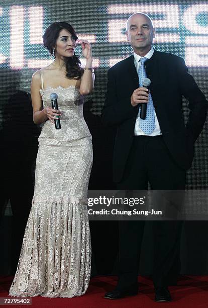 Actress Caterina Murino and director Martin Campbell attend the premiere of ''Casino Royale'' at the MegaBox theater on December 11, 2006 in Seoul,...