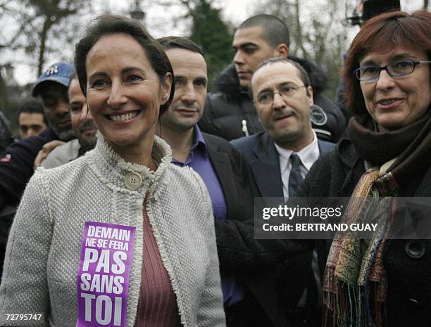 French Socialist presidential candidate Segolene Royal , flanked by her press attache Agnes Longueville and her campaign director Christophe Chantepy...