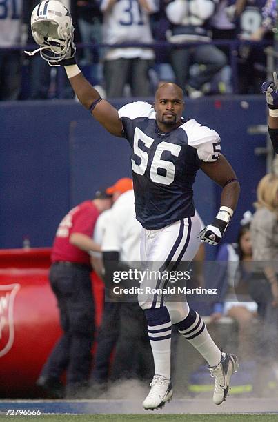 Bradie James of the Dallas Cowboys celebrates as he enters the field before the game against the Tampa Bay Buccaneers at Texas Stadium November 23,...