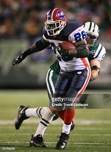 Anthony Thomas of the Buffalo Bills runs the ball against the New York Jets on December 10, 2006 at Giants Stadium in East Rutherford, New Jersey.