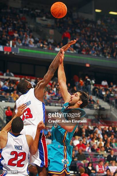 Nazr Mohammed of the Detroit Pistons blocks the shot by Peja Stojakovic of the New Orleans/Oklahoma City Hornets on November 15, 2006 at the Palace...