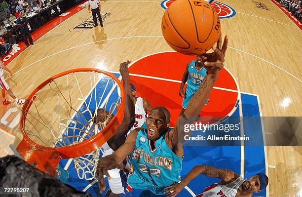 Cedric Simmons of the New Orleans/Oklahoma City Hornets goes to the hoop against the Detroit Pistons on November 15, 2006 at the Palace of Auburn...