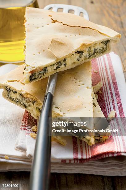 spinach and ricotta pie (three pieces on tea towel) - mushroom pie stock pictures, royalty-free photos & images