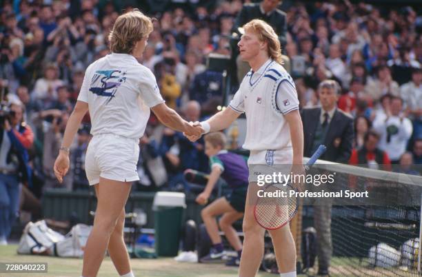 Swedish tennis player Stefan Edberg pictured shaking hands with West German tennis player Boris Becker after beating him 4-6, 7-6, 6-4, 6-2 in the...