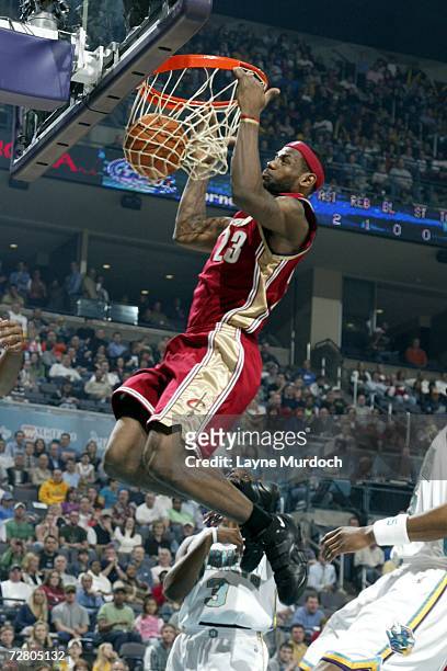 LeBron James of the Cleveland Cavaliers dunks against the New Orleans/Oklahoma City Hornets December 11, 2006 at the Ford Center in Oklahoma City,...