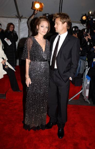 Actors Angelina Jolie and Brad Pitt arrive at the World Premiere of ''The Good Shepherd'' presented by Universal Pictures at the Ziegfeld Theatre on...
