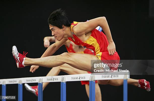 Liu Xiang competes in the Men's 110m Hurdles final during the 15th Asian Games Doha 2006 at the Khalifa Stadium December 11, 2006 in Doha, Qatar. Liu...