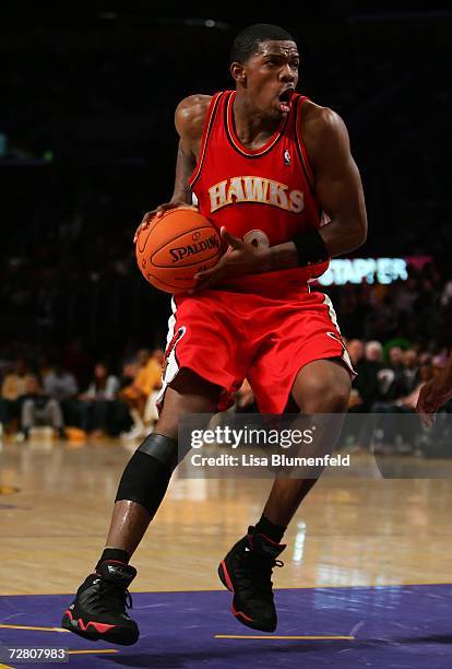 Joe Johnson of the Atlanta Hawks drives to te basket against the Los Angeles Lakers on December 8, 2006 at Staples Center in Los Angeles, California....