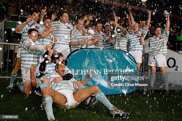 Cambridge celebrate after victory in the Lehman Brothers Varsity Match between Oxford University and Cambridge University at Twickenham on December...