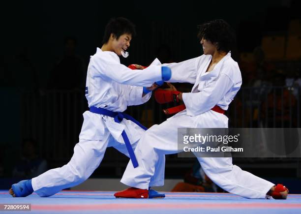 Huang Hsiang Chen of Chinese Taipei and Deepak Shrestha of Nepal competes in the Men's Karate 60kg Final Repechage during the 15th Asian Games Doha...