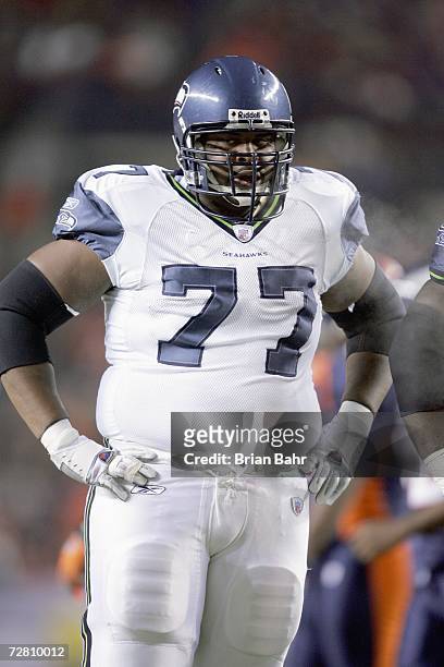 Floyd Womack of the Seattle Seahawks stands on the field during the game against the Denver Broncos on December 3, 2006 at Invesco Field at Mile High...