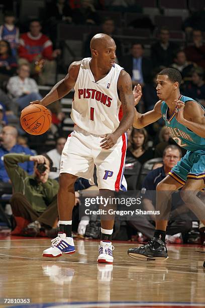 Chauncey Billups of the Detroit Pistons controls the ball against Jannero Pargo of the New Orleans/Oklahoma City Hornets on November 15, 2006 at the...