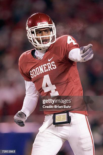 Malcolm Kelly of the Oklahoma Sooners points downfield against the Nebraska Cornhuskers during the 2006 Dr. Pepper Big 12 Championship on December 2,...