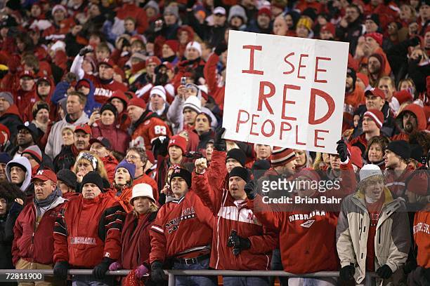 Fans of the Oklahoma Sooners cheer against the Nebraska Cornhuskers during the 2006 Dr. Pepper Big 12 Championship on December 2, 2006 at Arrowhead...
