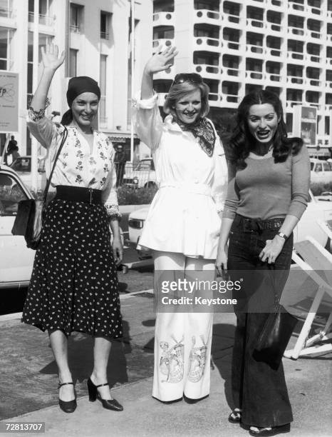 From left to right, actress Bernadette Lafont, TF1 presenter Evelyne Leclercq and actress Marie-France Pisier pose on the Croisette during the MIPTV...