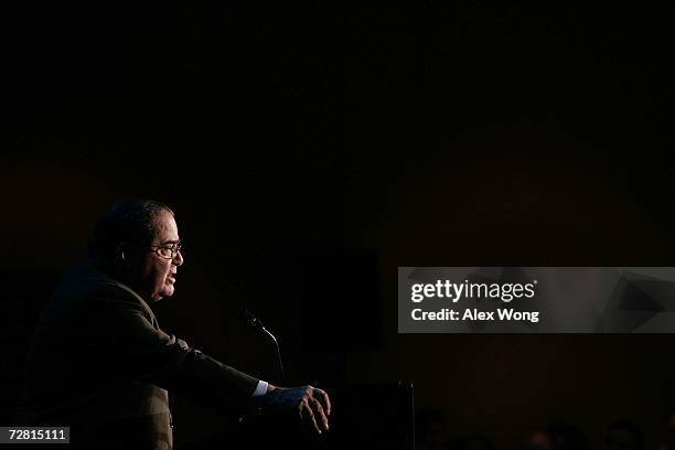 Supreme Court Associate Justice Antonin Scalia addresses a Northern Virginia Technology Council breakfast December 13, 2006 in McLean, Virginia....