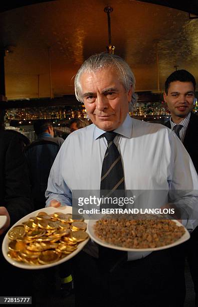 United Kingdom: Michael Powell, the winner of a challenge to identify a plate of myrrh, is pictured in a pub in central London, 13 December 2006....