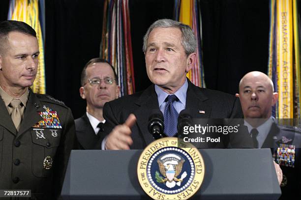 President George W. Bush speaks to the media after meeting with military advisors at the Pentagon as Chairman Joint Chiefs of Staff Gen. Peter Pace ,...