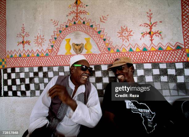 Portrait of two friends in a cafe April 2000 in Ghadames, Libya.