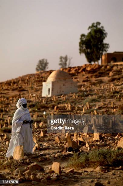 Muslim prays in the cemetery April 2000 in Ghadames, Libya.