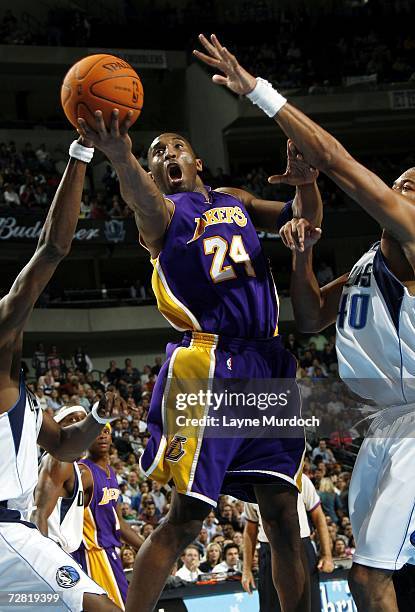 Kobe Bryant of the Los Angeles Lakers shoots the ball on the Dallas Mavericks on December 13, 2006 at the American Airlines Center in Dallas, Texas....