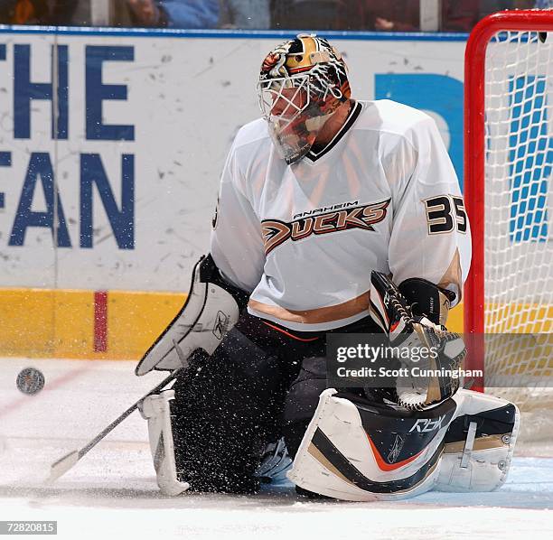 Goalie Jean-Sebastien Giguere of the Anaheim Ducks makes a save against the Atlanta Thrashers at Philips Arena on December 13, 2006 in Atlanta,...