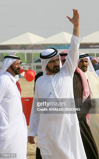Dubai ruler Sheikh Mohammed bin Rashid Al-Maktoum attends the Equestrian Endurance event during the 15th Asian Games, 14 December 2006, in Doha....