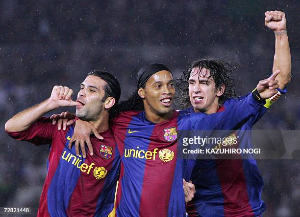 Spain's FC Barcelona defender Rafael Marquez of Mexico celebrates his goal with teammates, Ronaldinho of Brazil , defender Carlos Puyol , during the...