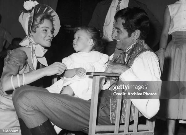 Swedish actress May Britt with American actor Henry Fonda and Fonda's adopted daughter Amy in Italy on the set of 'War And Peace', directed by King...