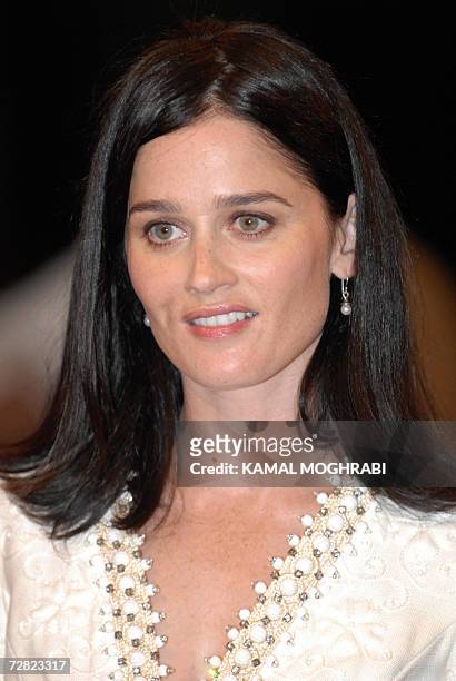 Dubai, UNITED ARAB EMIRATES: US actress Robin Tunney poses for pictures as she arrives to Hollywood Land movie premiere during the Dubai Film...