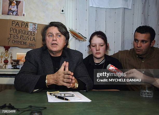 French defence lawyer Gilbert Collard and Priscilla Amri, wife of dead Tunisian worker Tarik Amri address the media in Argentan, Western France, 14...