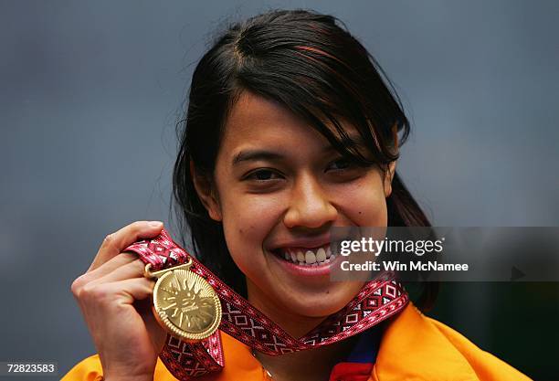 Gold medallist Nicol Ann David of Malaysia poses after the Women's Singles Final against Chiu Wing Yin of Hong Kong, China during the 15th Asian...