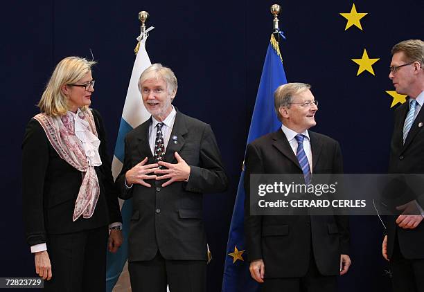 Austria's Federal Chancellor Wolfgang Schussel and his foreign affairs minister Ursula Plassnik are greeted by Finland's Prime Minister Maati Vahanen...