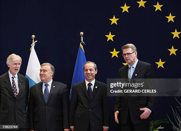 Malta's Prime Minister Lawrence Gonzi and his foreign minister Michael Frendo are greeted by Finland's Prime Minister Maati Vahanen and his foreign...