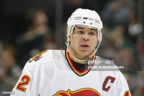 Jarome Iginla of the Calgary Flames pauses from action against the Minnesota Wild during the game at Xcel Energy Center on December 7, 2006 in Saint...